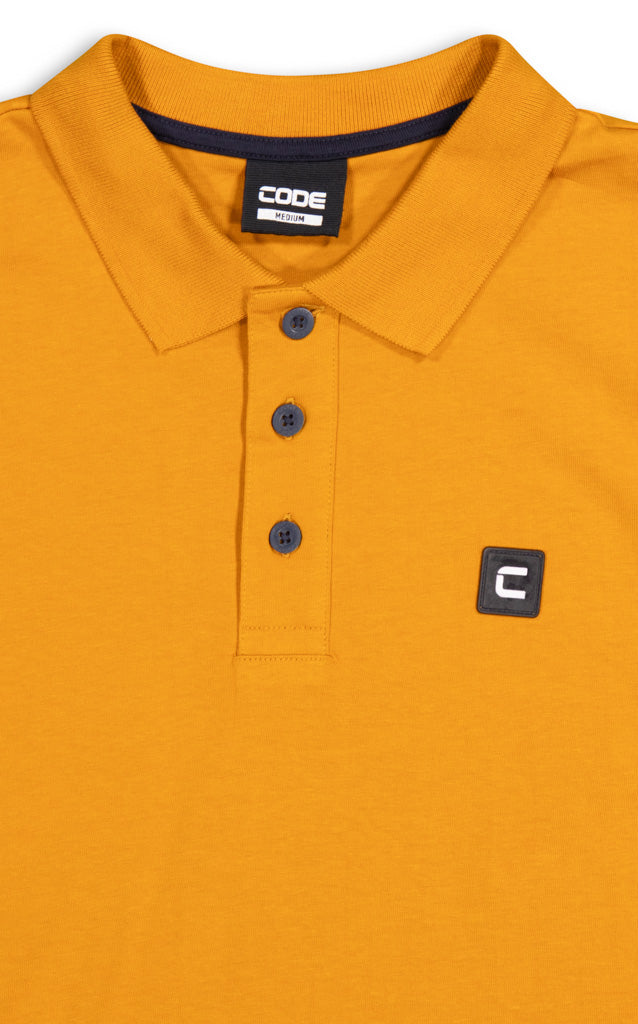 Close-Up View: Soft pique fabric with reinforced stitching.