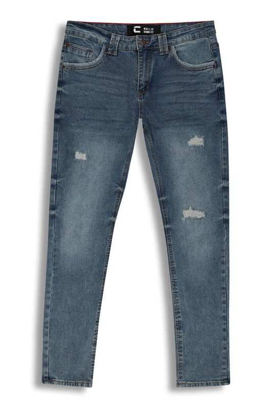 Skinny Fashion Jeans - Stone Wash front view, featuring a five-pocket design and distressed detailing for an urban edge.