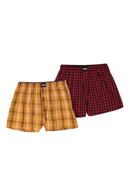 Front View: Comfortable woven boxers in a vibrant red and mustard plaid pattern.