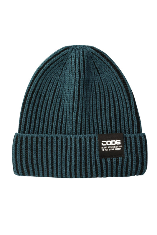 Front view: A refreshing opal blue beanie, blending warmth with a modern, trendy colour.